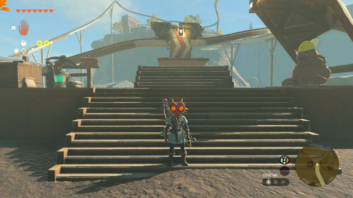 Link standing in front of the railcar platform to Tarrey Town in Tears of the Kingdom.