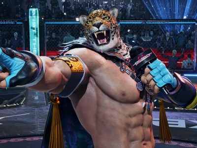 Tekken 8 - A wrestler in an animal mask holds a microphone