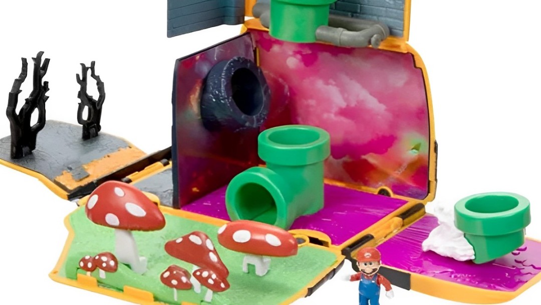 A playset wit green pipes, mushrroms, and a mario figurine