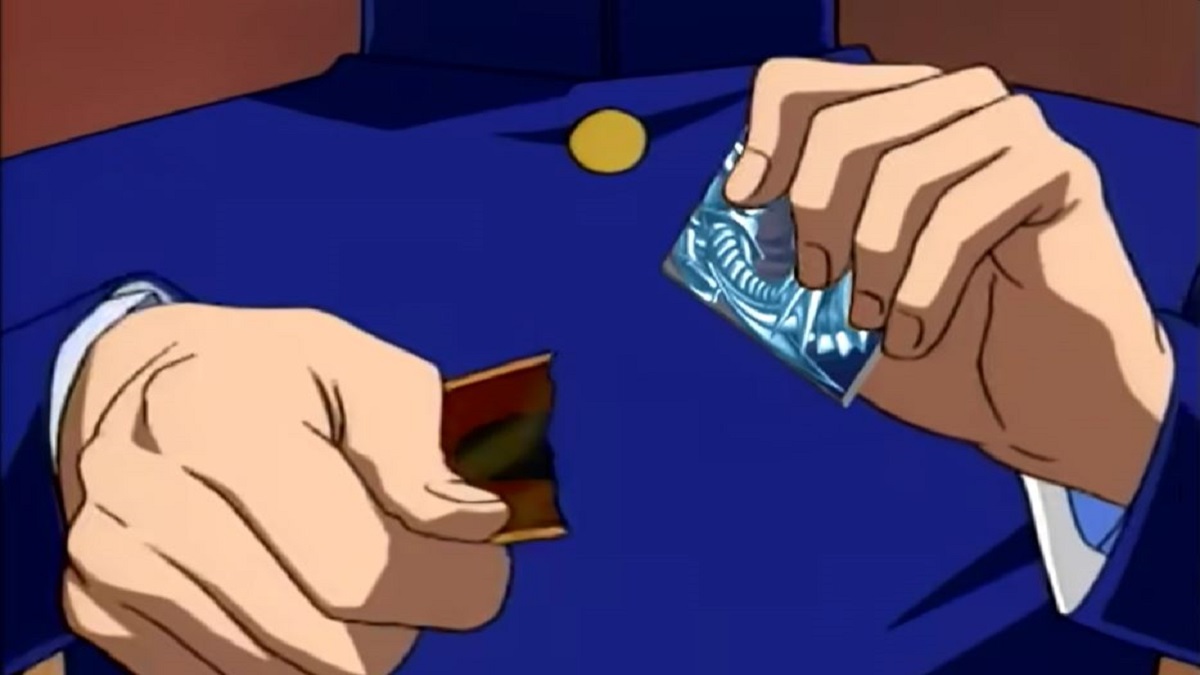 Seto Kaiba rips the fourth Blue Eyes card