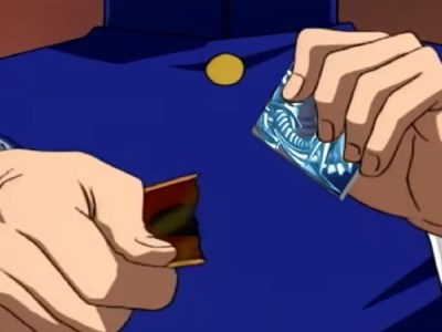 Seto Kaiba rips the fourth Blue Eyes card