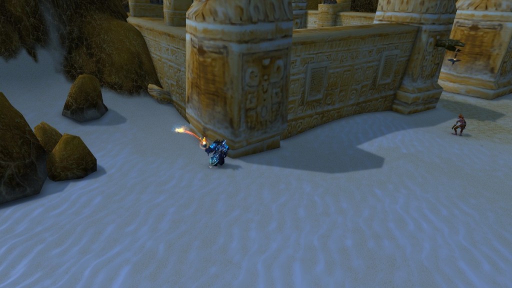 A player using the Torch of Pyrreth to uncover the third Ancient Treasure Note in WoW