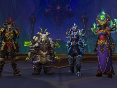 A Death Knight, Hunter, Druid, and Warlock wearing Season One The War Within tier sets standing in Nerub-ar Palace