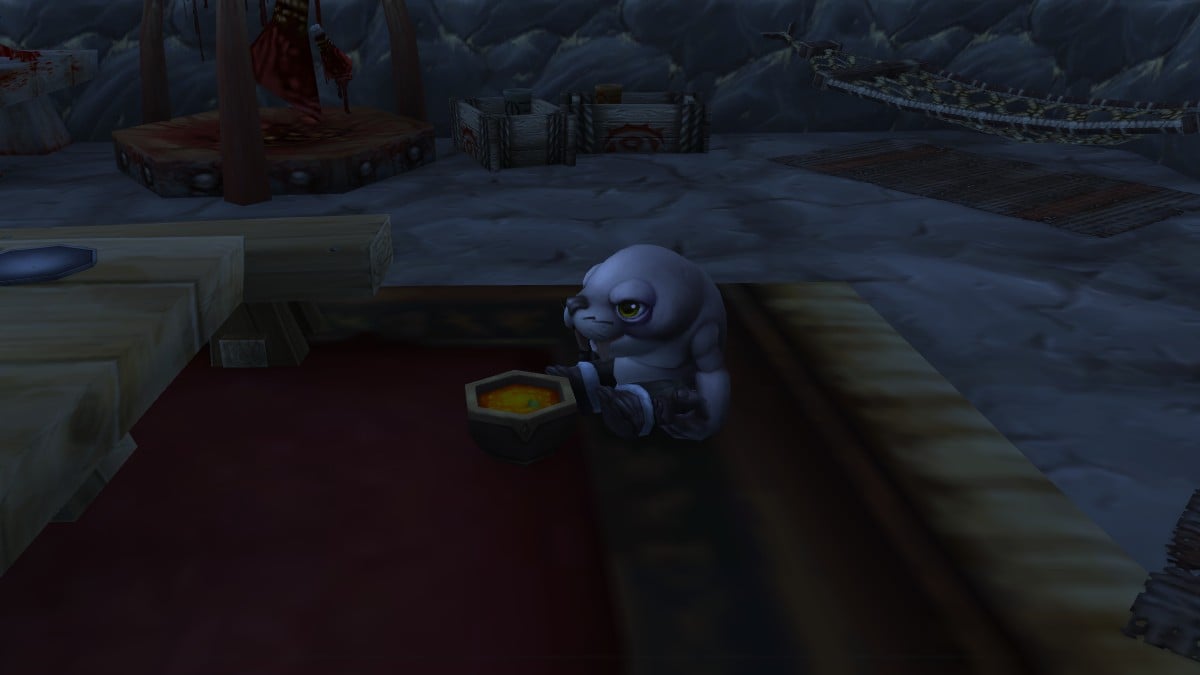 Yennu the Tuskarr enjoying soup in World of Warcraft