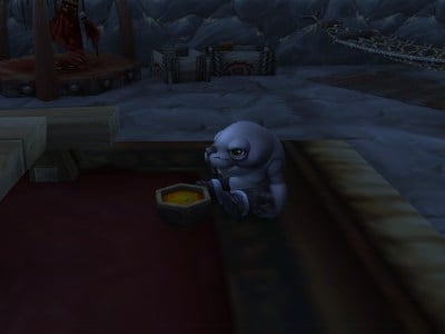 Yennu the Tuskarr enjoying soup in World of Warcraft