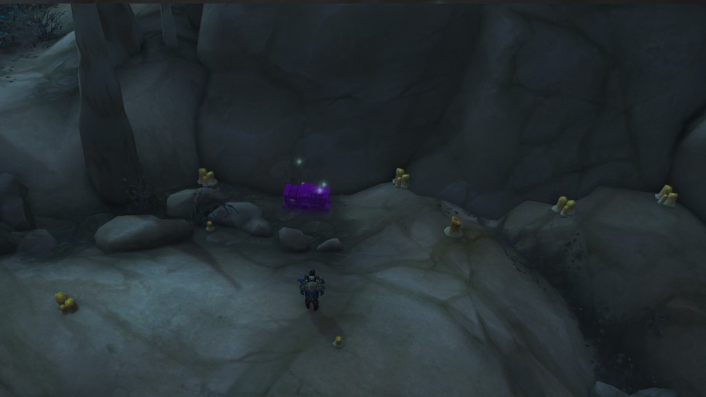 The Dark Scary Chest surrounded by unlit candles in WoW