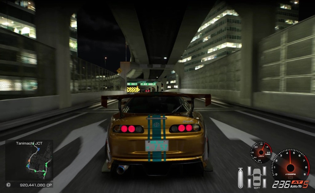 tokyo xtreme racer - A yellow car driving quickly.