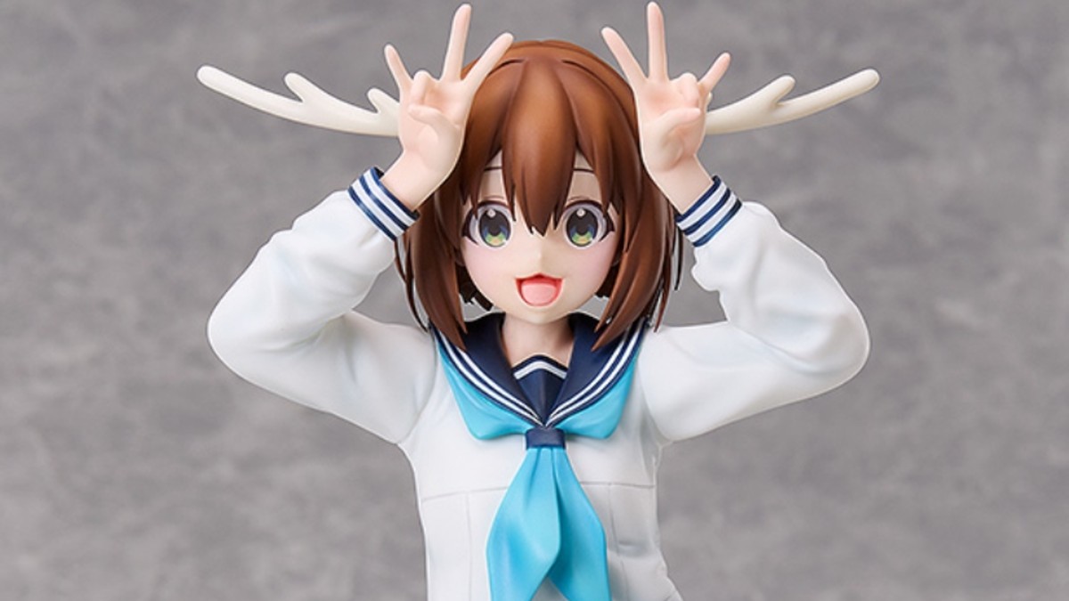 A figurine of Noko Shikanoko from My Deer Friend Nokotan. Her mouth is open and her hands are beside her head, imitating antlers with her fingers. She is wearing a Japanese school uniform with a light blue tie